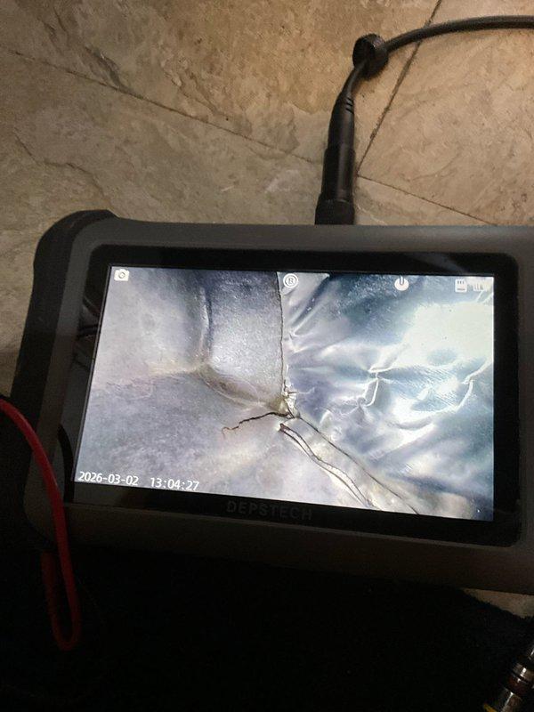 Responded to residential no heat complaint where furnace was short-cycling (running for 3-5 minutes before shutting off and restarting after approximately 10 minutes). Performed diagnostic inspection using DEPSTECH camera which revealed cracks in heat exchanger, and verified proper electrical connections to control board with all wiring intact and properly terminated.