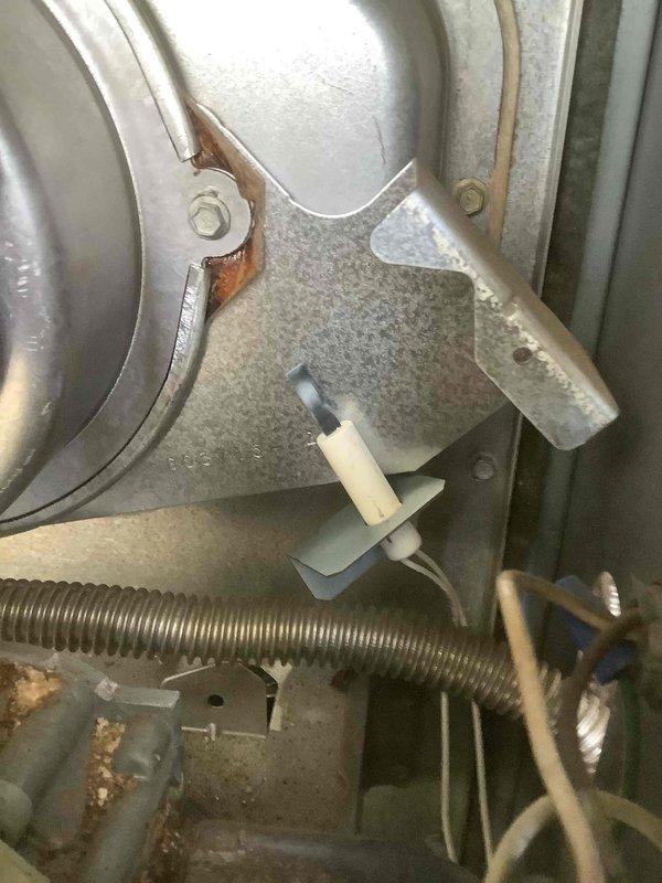 Performed standard maintenance tune-up on 12+ year old furnace. Inspected blower assembly and ignition system, noting minor oxidation on metal components but system functioning within normal parameters. Cleaned and tested all essential components to ensure proper operation for the upcoming heating season.