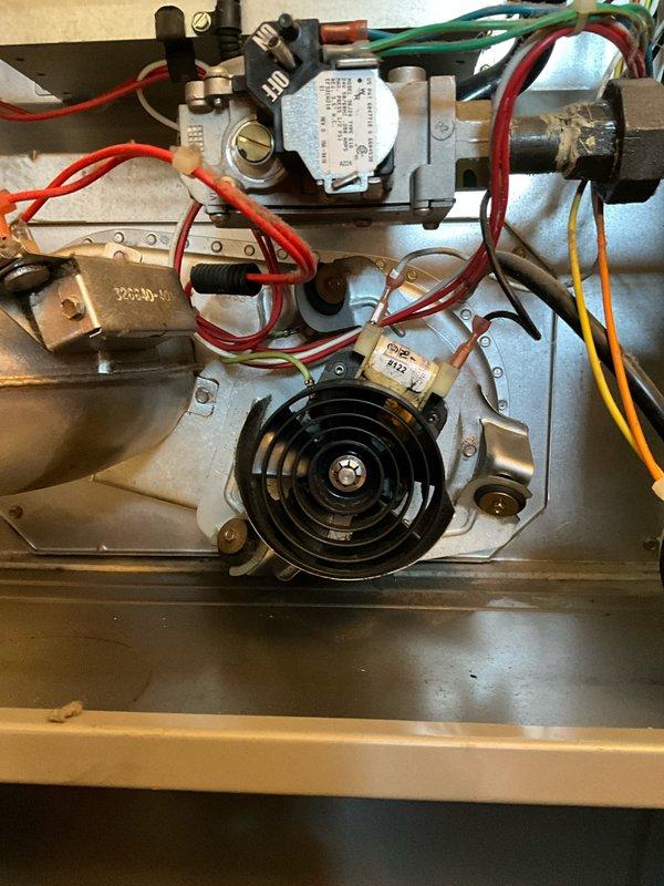 Responded to no heat call and performed diagnostic inspection of system. Examined thermostat settings and verified proper configuration. Inspected blower motor assembly and electrical components, finding loose wiring connections at the control board which were preventing proper heat cycle activation. Reconnected wires securely and tested system through complete heating cycle to confirm proper operation.