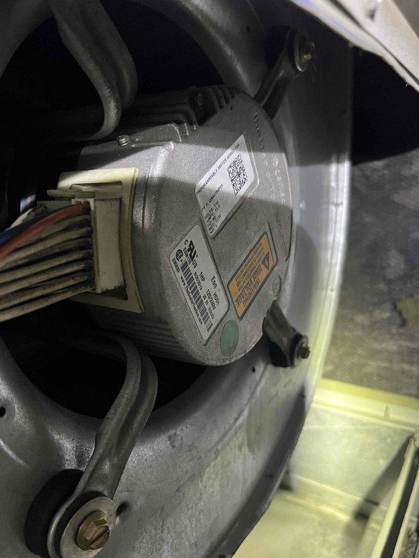 Successfully replaced defective ECM blower motor in customer's Trane furnace with new programmable 115V unit. Verified proper wiring connections and mounting of replacement motor within the system housing. Unit was staged at headquarters before installation and is now functioning correctly.