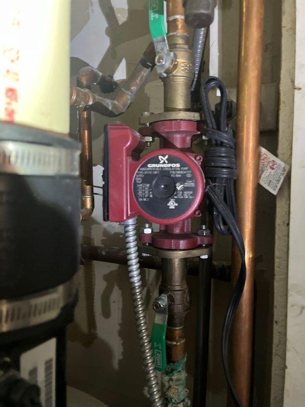 Completed replacement of a failing Grundfos circulation pump in the customer's hydronic boiler system. Installed new pump using existing copper piping connections, verified proper operation of all valves, and tested system functionality. System now operating at optimal efficiency with no leaks observed at connection points.