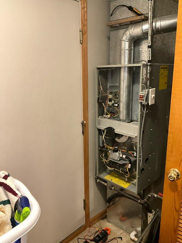 Successfully installed a Lennox SL280DF070V36A 80% efficient downflow furnace as a replacement unit in utility closet. Existing thermostat was reinstalled and system functionality verified. Installation included proper connection to existing ductwork with good accessibility for future maintenance.