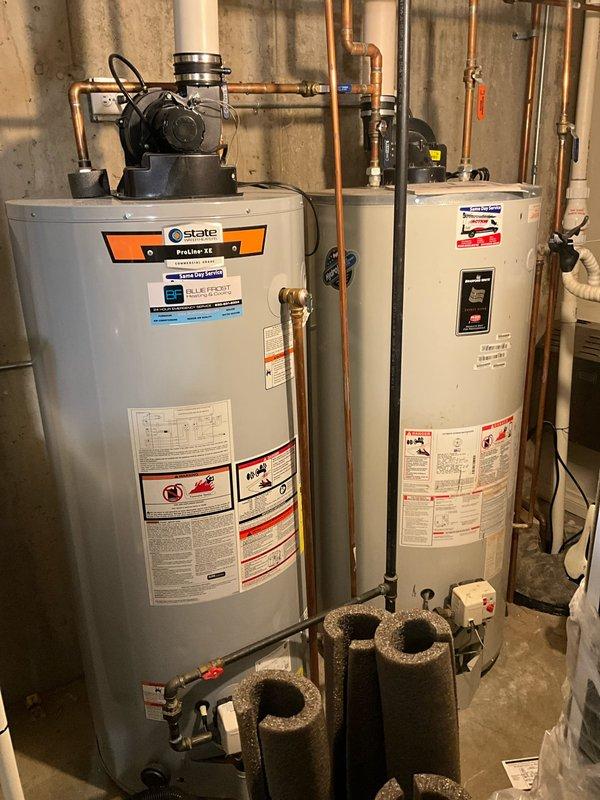 Performed bi-annual BFMA tune-up service on dual HVAC system (2 furnaces with integrated humidifiers). Inspected blower wheel assembly on first floor unit which customer reported wasn't heating efficiently, cleaned accumulated debris from fan blades to restore proper airflow. Verified operation of both water heaters in mechanical room, confirming proper venting and connection integrity.