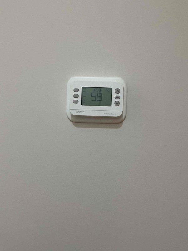 Performed scheduled humidifier tune-up service and conducted comprehensive client education on proper system operation. Inspected Honeywell thermostat functionality and verified proper wiring connections to the humidifier control valve. System left operating at optimal performance with client demonstrating understanding of operational controls.