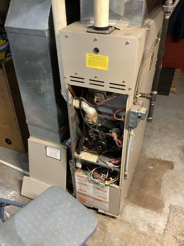 Responded to no-heat complaint at secondary residence on property. Upon inspection, removed furnace access panel to diagnose system. Identified faulty ignition sequence preventing proper heating cycle and performed necessary repairs to restore heat function.
