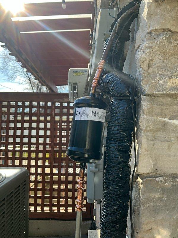 Successfully installed and commissioned new AC system with proper electrical connections. Installed 20A2P Square D circuit breaker and verified complete system operation per installation worksheet. System includes 10-year labor and parts warranty coverage.