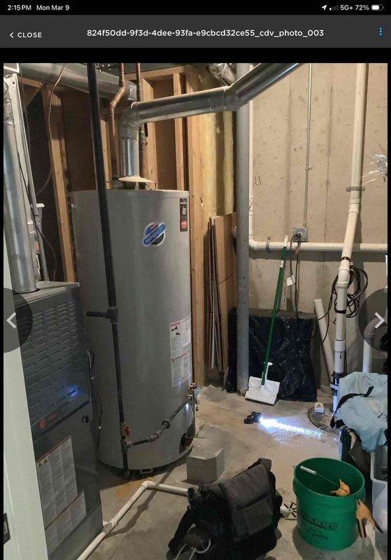 Successfully installed a 75-gallon domestic water heater in residential utility area. Completed installation with proper venting and pipe connections. No expansion tank, anode rod, or drain pan was included in this installation.