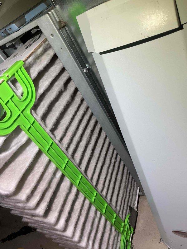 Performed maintenance tune-up on a 7-year-old furnace system. Inspected and cleaned internal components including electrical connections and condensate trap. Replaced severely clogged air filter which showed significant dust accumulation, improving system airflow and efficiency.