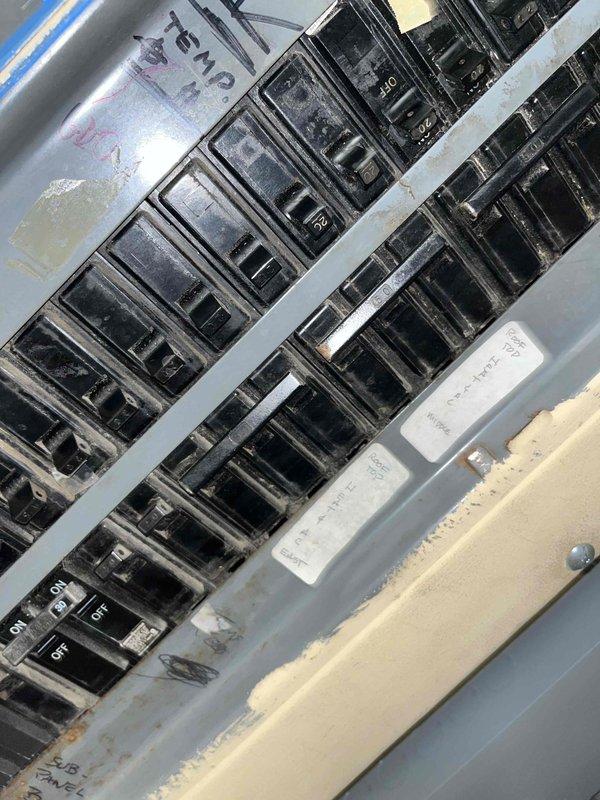 Responded to commercial RTU service request regarding excessive gas consumption. Inspected electrical sub-panel and found proper circuit connections. Discovered significant rust and mineral deposits around roof vent pipe indicating possible water infiltration, which may contribute to system inefficiency or heat loss requiring further investigation.