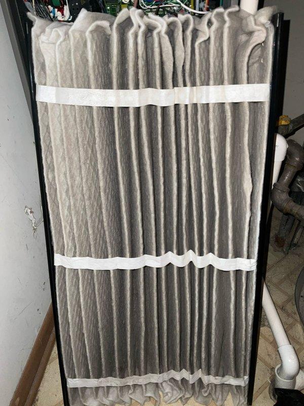 Performed annual BFMA tune-up on 11-month-old Lennox furnace system. Inspected filter showing moderate dust accumulation but still functional; examined ductwork connections, condensate drainage system, and verified proper installation of PVC venting. All components operating within manufacturer specifications with no issues detected.