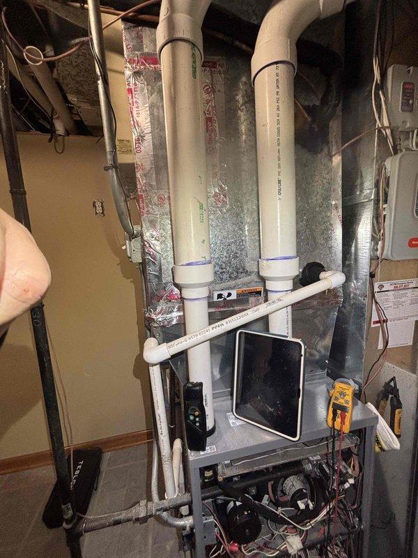 Performed comprehensive maintenance tune-up on residential furnace system. Inspected Honeywell equipment including heat exchanger, burners, and electrical connections. Tested system operation, verified proper venting through PVC exhaust/intake piping, and confirmed all safety controls were functioning correctly.