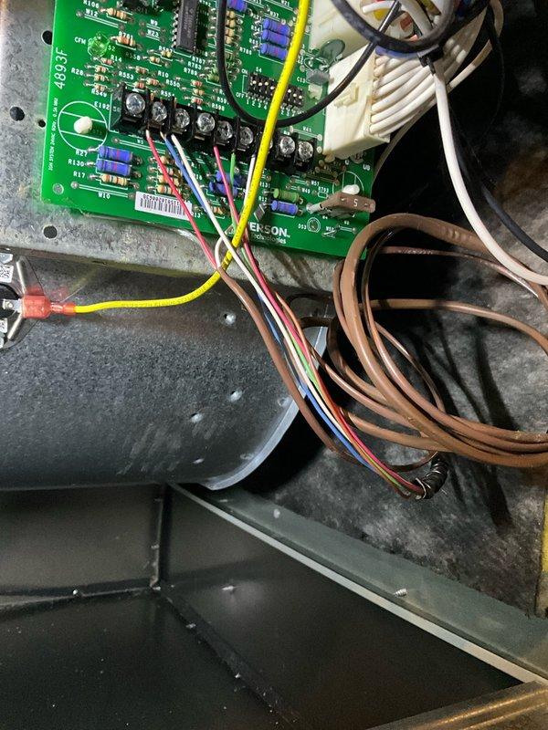 Performed comprehensive furnace tune-up including inspection of Smith water heater system and examination of Emerson control board circuitry. Verified all electrical connections were secure with proper wire routing, and confirmed system components were functioning within normal parameters with no evidence of damage or abnormal wear.