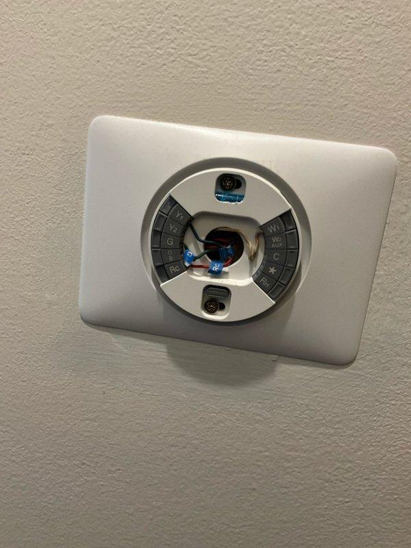 Responded to after-hours call for heater ignition issue. Diagnosed faulty thermostat wiring connections and inspected system capacitor. Repaired loose/damaged wiring at thermostat terminal connections and verified proper system operation.