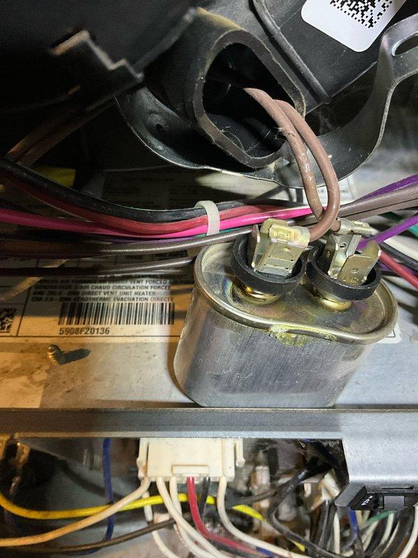 Responded to after-hours call for heater ignition issue. Diagnosed faulty thermostat wiring connections and inspected system capacitor. Repaired loose/damaged wiring at thermostat terminal connections and verified proper system operation.