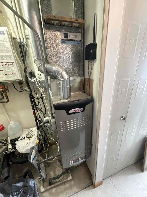Performed non-member maintenance furnace tune-up on a 3-year-old Lennox system. Inspected and cleaned the pleated air filter housing and evaluated the furnace installation in utility closet, including ductwork connections, ventilation pipes, and control panel functionality. All components were found to be in proper working condition.