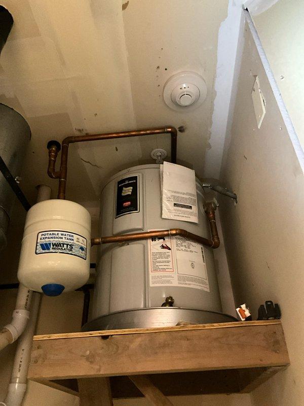 Performed routine BFMA tune-up maintenance on two furnaces in a 3+ year old system. Inspected and documented condition of air filter showing signs of wear with visible tearing at top edge, requiring replacement. Secondary inspection of water heating system revealed properly functioning expansion tank and copper piping connections with no apparent leaks or issues.