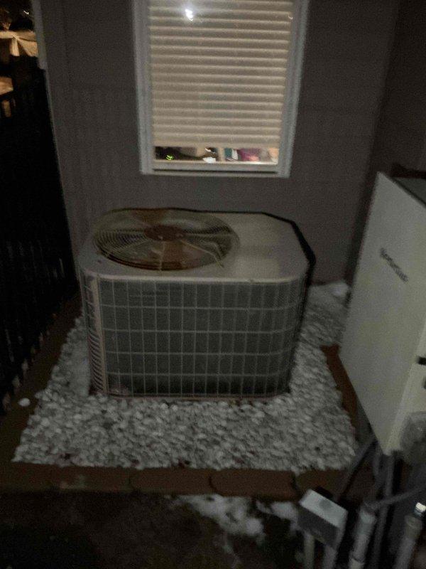 Responded to after-hours call for heating system failure in 1990s model equipment that had been previously serviced without resolution. Performed diagnostic inspection of both the indoor furnace unit and outdoor condenser, documenting the condition of the mechanical room setup including water heater integration and associated PVC/copper piping network. System requires follow-up service due to age-related component deterioration.