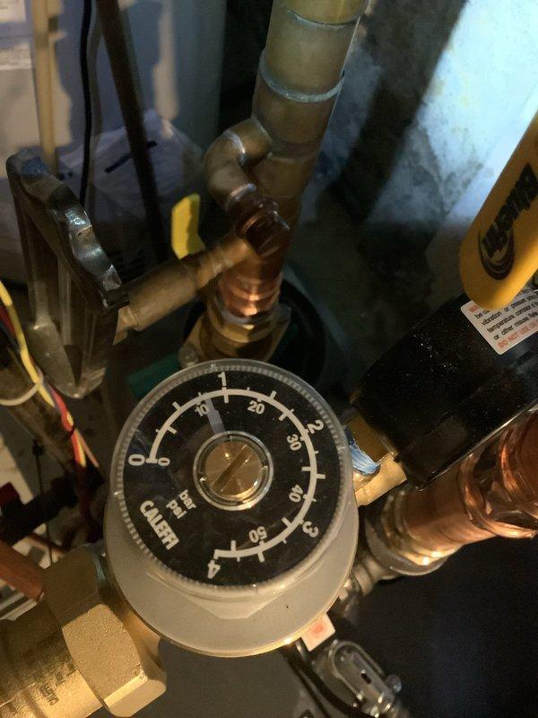 Responded to no heat call for recently installed boiler (2 days old). Upon inspection, found disconnected zoning and system pressure at approximately 40 PSI (significantly above normal operating range). Properly reconnected zoning system and adjusted pressure to manufacturer specifications, restoring heat function to residence.