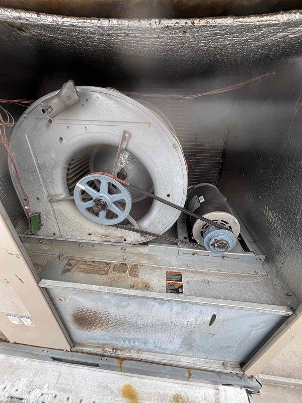 Successfully replaced malfunctioning Variable Frequency Drive (VFD) in commercial Lennox rooftop unit with new component that was staged at headquarters. Verified proper operation of belt-driven blower assembly and motor connections following installation, ensuring system functionality was fully restored.