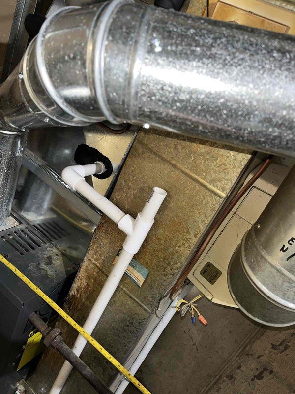 Performed diagnostic assessment on heating system after client reported burning odor. Inspection revealed a failing blower motor that was overheating. Provided comprehensive replacement estimate for new furnace, with detailed documentation of the current installation including ductwork configuration, condensate drainage system, and existing mechanical components to ensure proper equipment specification.