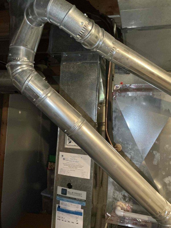 Conducted furnace replacement consultation for a 20-year-old existing Carrier heating system. Assessed current equipment configuration, documented existing ductwork connections and air handler setup, and reviewed available upgrade options with customer including applicable manufacturer promotions and association member discounts.