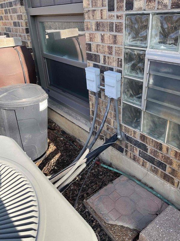 # HVAC Full System Replacement - System #2

Completed full Lennox system replacement for second of twinned HVAC systems serving residential property. Removed existing equipment and installed new ML180UH090E48B high-efficiency furnace with ML13KC1-048-230 condensing unit rated at 4 tons. Installed CK40UT-48B uncased evaporator coil and integrated 1-inch media filter for improved air quality. Replaced complete venting system with appropriately sized materials per manufacturer specifications and local code requirements.

Installed new 40A2P Siemens circuit breaker to provide dedicated electrical service to equipment. Ran electrical disconnect boxes and conduit to outdoor condensing unit, ensuring proper wire sizing and protection. Reconnected and tested existing thermostat for proper communication with new system. Configured standard installation with furnace positioned below existing setup, maintaining accessibility for future service requirements.

Positioned outdoor condensing unit on 