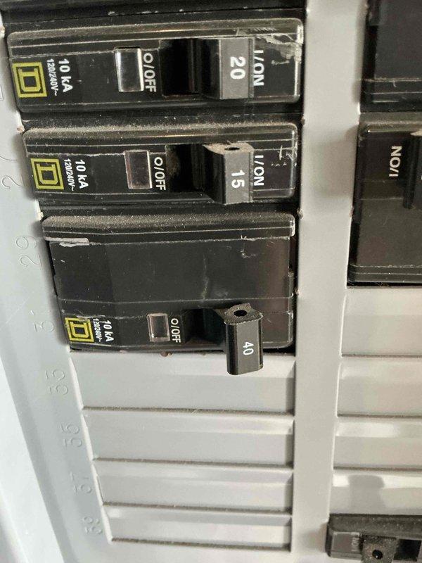 Performed comprehensive assessment of existing 21+ year old HVAC system for full replacement estimate. Evaluated furnace and air conditioning unit, both original equipment at end of serviceable life. Documented electrical panel configuration including dedicated 40-amp circuit with lockout device, verified proper breaker sizing and capacity for new equipment installation. Assessed existing ductwork condition, clearances, and mechanical room layout to determine replacement requirements and compatibility with modern high-efficiency equipment.