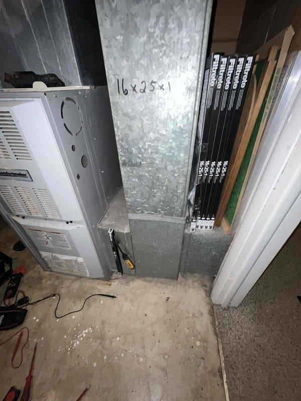 Conducted comprehensive in-home assessment for full HVAC system replacement in basement installation. Evaluated existing white furnace unit and associated ductwork configuration, including 16x25x1 filter dimensions. Inspected electrical panel capacity and circuit breaker arrangement to verify adequate power supply for new equipment installation, noting dedicated circuits for furnace and A/C unit. Documented current system layout, ductwork connections, and installation space requirements to provide accurate equipment sizing and replacement proposal.