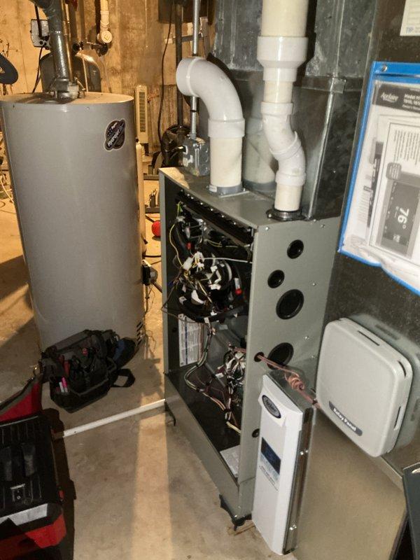 Completed comprehensive furnace tune-up on 3-year-old unit in basement mechanical room. Performed standard maintenance protocol including inspection of burner assembly, heat exchanger, blower motor, and control board with access panel opened for thorough examination. All components found operating within normal parameters, venting system inspected and confirmed proper operation, and unit returned to service with no issues identified.