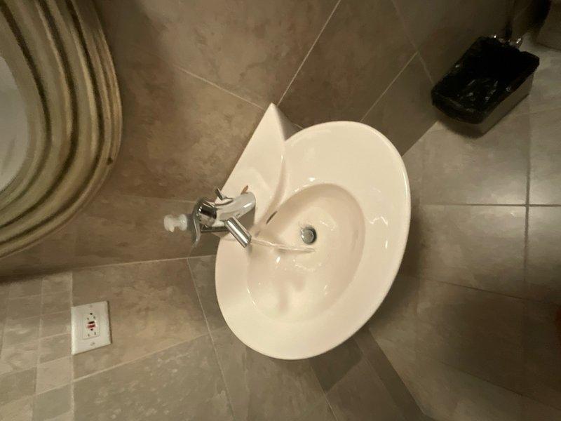 Completed comprehensive BFPMA plumbing maintenance inspection including full bathroom fixture evaluation and sump pump assessment. Inspected toilet operation, flush mechanism, and water supply connections; verified pedestal sink drainage, faucet function, and trap integrity; checked all visible supply lines and shut-off valves for leaks or deterioration. Sump pump inspection conducted to verify operational status and discharge functionality. All fixtures found in proper working order with no active leaks or immediate service needs identified.