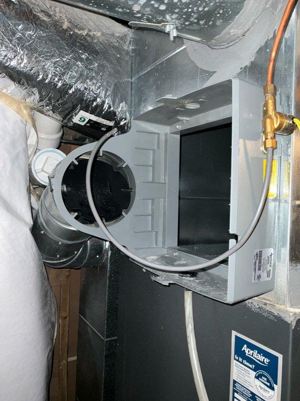 Completed comprehensive BFMA tune-up service including furnace maintenance, humidifier inspection and servicing, and semi-annual filter replacement with 16x25x5 filter. Inspected blower motor assembly, verified all electrical connections and wiring configurations, and examined ductwork system including supply plenum and flexible duct connections. All HVAC components including Aprilaire humidifier found operating within normal parameters with no issues identified.