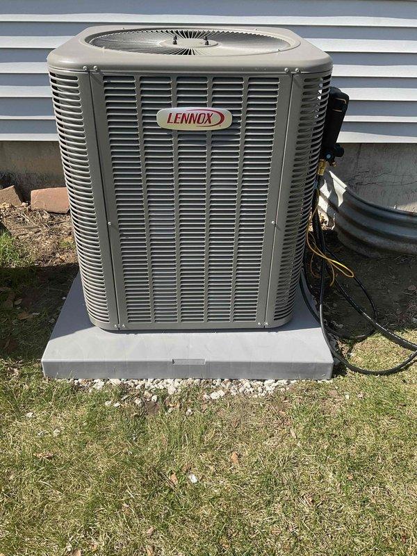 Completed air conditioning installation and system startup for Lennox ML1KC1-036 outdoor condensing unit with previously installed evaporator coil. Set up outdoor unit on concrete pad, connected refrigerant lines and electrical conduit, and performed comprehensive system startup procedures using Fieldpiece SMAN digital manifold to verify proper refrigerant pressures, temperatures, and overall system operation.