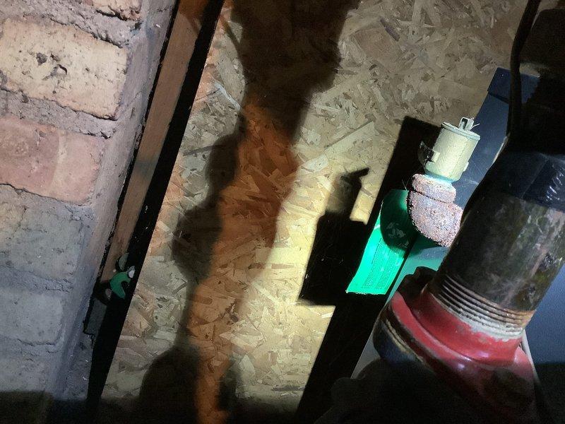 Responded to service call for boiler system with uneven heating throughout the home that had persisted for approximately two weeks. Upon inspection, discovered severely corroded heat exchanger with extensive rust formation on metal fins and internal components, indicating advanced deterioration and potential safety concerns. Documented equipment condition showing significant oxidation on copper piping, heat exchanger degradation, and debris accumulation within the unit, requiring immediate attention to restore proper heating distribution and system safety.