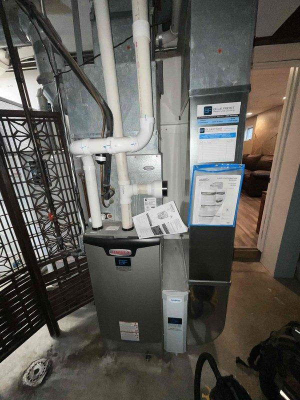 Completed comprehensive furnace tune-up on a one-year-old unit installed in basement utility area. Performed standard maintenance protocol including system inspection, filter evaluation, combustion analysis, and safety checks. All components found operating within normal parameters; unit demonstrated proper function with no immediate service requirements identified.