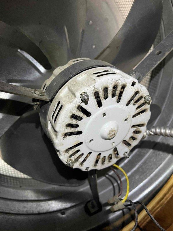 Responded to service call for non-operational roof exhaust fan that had been inoperative for several years. Inspected motor assembly and fan blades within HVAC system, documented existing wiring connections including electrical conduit, and assessed ventilation system components to determine necessary repairs for proper exhaust venting through roof-mounted unit.