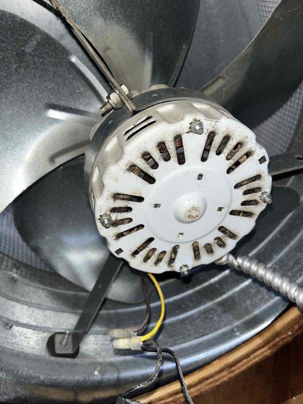 Responded to service call for non-operational roof exhaust fan that had been inoperative for several years. Inspected motor assembly and fan blades within HVAC system, documented existing wiring connections including electrical conduit, and assessed ventilation system components to determine necessary repairs for proper exhaust venting through roof-mounted unit.