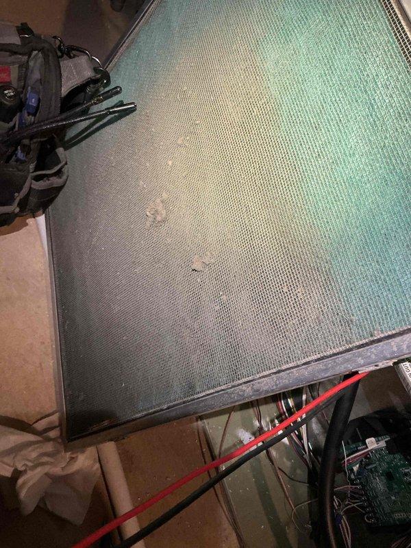 Completed comprehensive furnace tune-up on a 7+ year old heating system. Performed standard maintenance procedures including inspection of the evaporator coil and air filter assembly, which showed dust accumulation and discoloration requiring attention. All mechanical components, ductwork connections, and system controls were inspected and verified for proper operation to ensure optimal heating performance for the upcoming season.