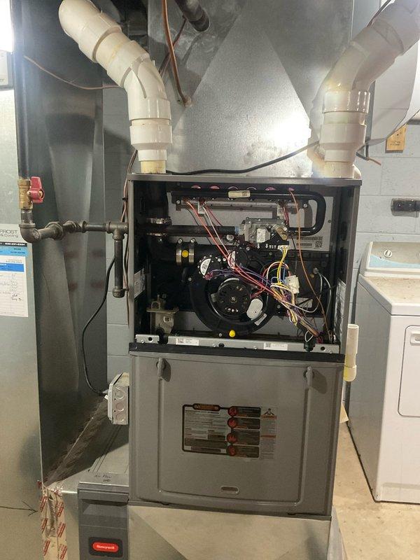 Responded to a no-heat callback after previous gas valve replacement. Upon arrival, indoor temperature had dropped to 55 degrees with furnace not operating. Accessed furnace cabinet and control panel to diagnose recurring failure. Inspected internal components including blower motor assembly, ignition control board, electrical connections, and gas valve installation from prior service visit. Documented furnace condition and control circuitry for further troubleshooting and repair.