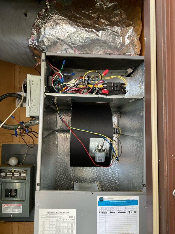Responded to no heat call at residential property. Upon arrival, accessed air handler unit and inspected internal components including blower assembly, electrical connections, and control board. Verified thermostat was calling for heat with setpoint at 70 degrees. Performed system diagnostics, checked all electrical connections, and tested capacitor functionality. System restored to proper operation with heat confirmed at thermostat.