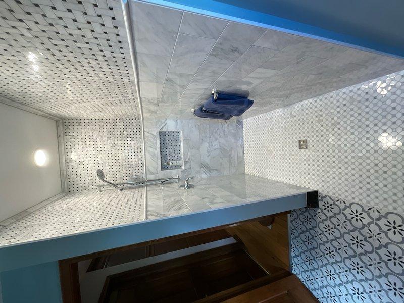 Performed comprehensive plumbing inspection of the property and addressed a reported issue with the master bathroom toilet. Inspected the toilet tank's internal components, including the fill valve assembly, flush valve mechanism, float ball system, and overflow tube to diagnose the malfunction and ensure proper operation.