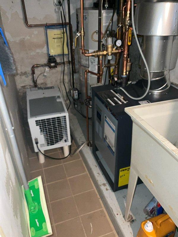 Responded to service call for non-operational boiler system. Upon arrival, performed diagnostic assessment of recently installed heating unit and associated controls. Inspected Unity-CI control panel displaying operational parameters including temperature readings of 141.0°F and burner firing rate at 94%, indicating system was functioning at time of inspection. Verified all electrical connections, control wiring, and safety interlocks were properly secured and operational. Examined boiler installation including copper piping connections, pressure gauge readings, expansion tank, and associated plumbing infrastructure. System tested and confirmed operational with burner cycling properly and achieving target temperatures. Provided operational guidance to homeowner regarding normal system functions and display readings.