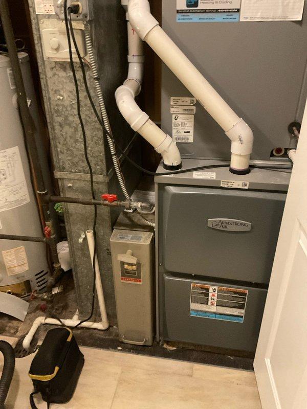 Completed comprehensive BFMA tune-up service on residential HVAC system including Armstrong furnace and outdoor condensing unit, both 2+ years old. Performed full inspection of furnace components, verified proper operation of blower motor, checked heat exchanger integrity, tested safety controls, and inspected PVC intake and exhaust venting for proper configuration and secure connections. Conducted outdoor unit maintenance including cleaning of condenser coils, inspection of fan motor operation, verification of refrigerant levels, and assessment of electrical connections. All equipment operating within manufacturer specifications with no immediate concerns identified.