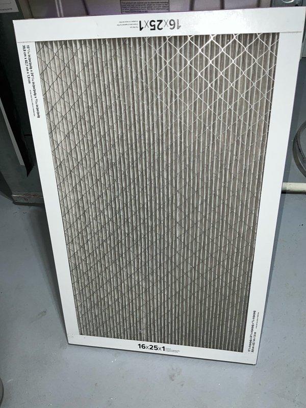 Completed comprehensive BFMA tune-up service on a Carrier air conditioning system over 5 years old during afternoon appointment window. Performed full AC tune-up including inspection of outdoor condenser unit, verified proper electrical connections and conduit integrity, assessed drainage and gravel base installation, and replaced 16x25x1 air filter. All components found operating within normal parameters with no immediate repairs required.