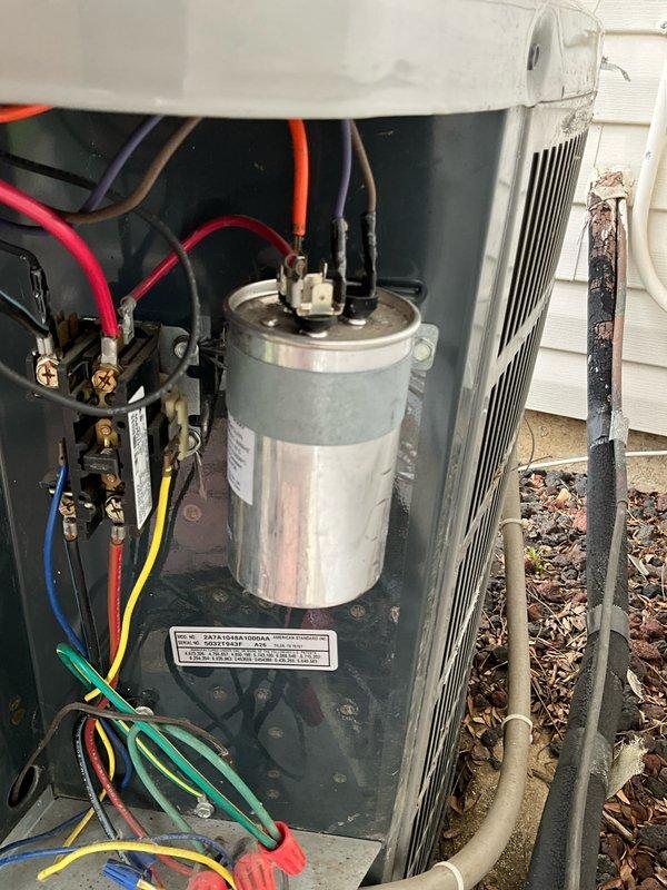 Completed comprehensive BFMA tune-up on 20+ year old outdoor air conditioning unit. Upon arrival, found condenser coils heavily clogged with dirt, dust, and debris accumulation significantly restricting airflow. Performed thorough cleaning of condenser coils and exterior surfaces to restore proper heat transfer efficiency. Inspected electrical components including capacitor, wiring connections, and control circuits. Verified all electrical connections were secure and tested capacitor functionality. Cleared vegetation and debris from unit perimeter and base. Unit operational and running within normal parameters upon completion.