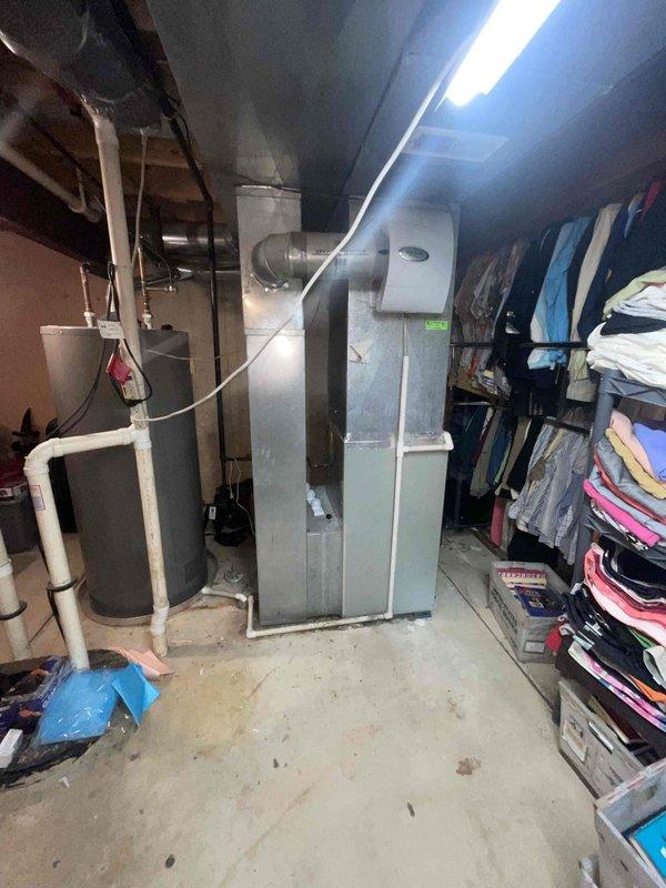 Responded to no heat call at residential property. Upon arrival, performed diagnostic inspection of gas furnace located in basement utility area. Conducted visual inspection of unit, ductwork connections, and associated components including condensate drainage system. Verified proper clearances around equipment and inspected main supply plenum and metal ductwork for integrity. Tested system operation and restored heating functionality to residence.