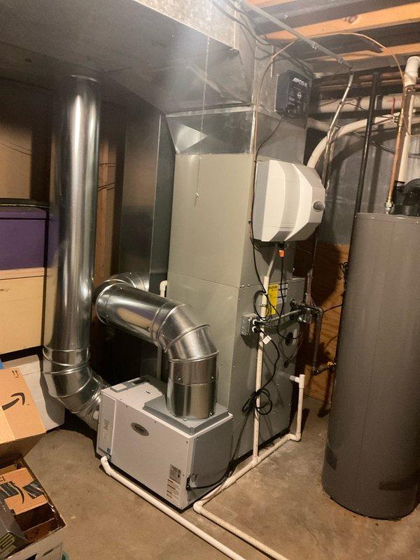 Completed comprehensive BFMA tune-up on 5+ year old HVAC system including air conditioning unit, air cleaner, and dehumidifier. Inspected and serviced furnace/air handler assembly, verified proper operation of humidifier drum and associated components, and replaced air filter which showed moderate dust accumulation. All mechanical systems tested and confirmed operational with no issues identified.