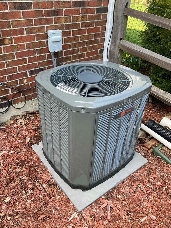 Completed scheduled BFMA tune-up maintenance on two residential air conditioning units. The first outdoor condenser unit exhibited severe accumulation of dust, dirt, and debris on the condenser coils, with thick matted buildup significantly restricting airflow and reducing system efficiency. Removed top protective grille to access interior components, thoroughly cleaned condenser coils to restore proper heat transfer capability, and inspected compressor, capacitor, and refrigerant lines. The second unit was found in good operating condition with minimal debris accumulation. Performed standard maintenance procedures on both systems including inspection of electrical connections, disconnect boxes, and all accessible components to ensure safe and efficient operation for the cooling season.
