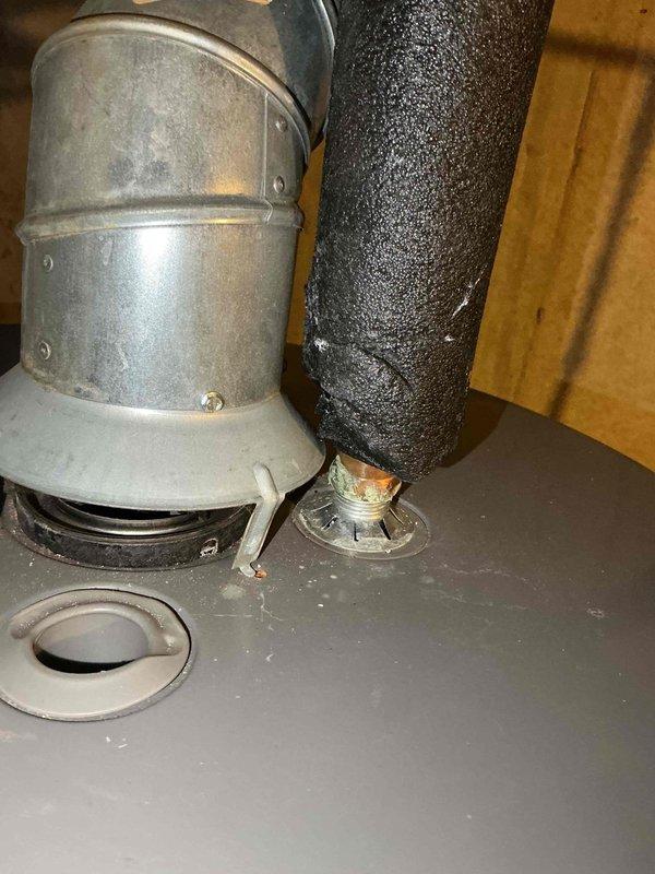 Completed comprehensive BFMA tune-up service on 3-year-old residential HVAC system during scheduled afternoon appointment. Performed standard preventive maintenance procedures including system inspection, filter check, and operational testing of air conditioning components. Documented equipment condition with photographic records of water heater installation showing proper venting configuration and manufacturer specifications for service history reference.