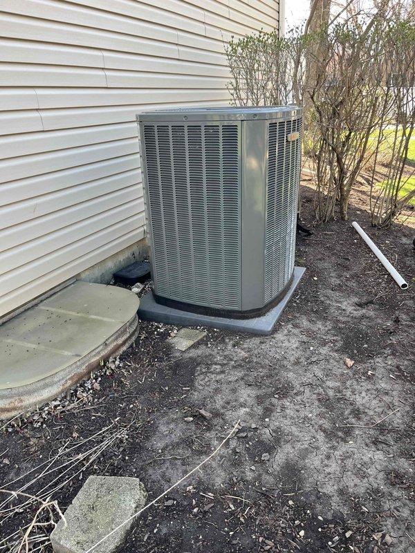 Completed comprehensive BFMA tune-up on 7+ year old residential air conditioning system during afternoon appointment window. Performed full system inspection of outdoor condenser unit, evaluated condenser coil condition noting accumulated debris between fins, and documented equipment status with detailed photography. All standard maintenance procedures were executed according to BFMA protocol specifications for aging AC equipment.