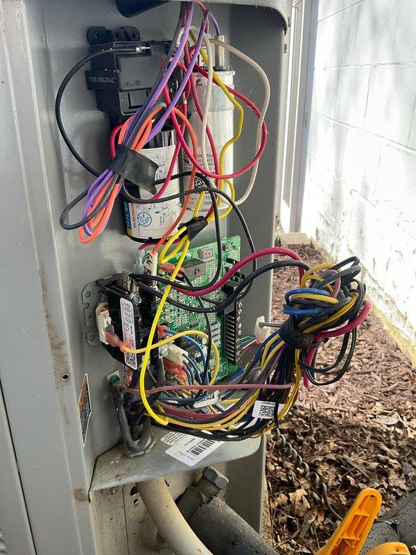 Completed comprehensive BFMA tune-up on residential HVAC system aged 8+ years. Performed full air conditioning maintenance including inspection of electrical components, contactors, relays, and control panel wiring, replaced air filter with new pleated media filter, and verified all electrical connections and system controls were properly functioning. Retrieved plumbing equipment (two Milwaukee batteries and chargers) from bathroom as requested and documented system condition with photos.